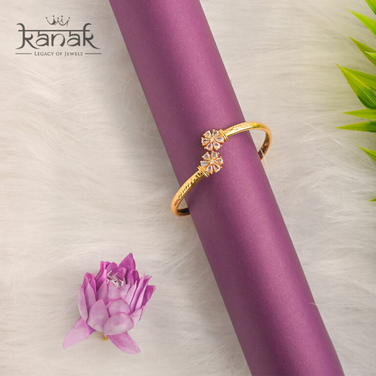 “bloom in gold: elegant floral cluster open cuff bangle”