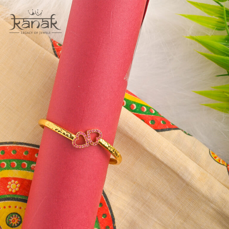 “two hearts, one shine — a symbol of love in 24k gold”